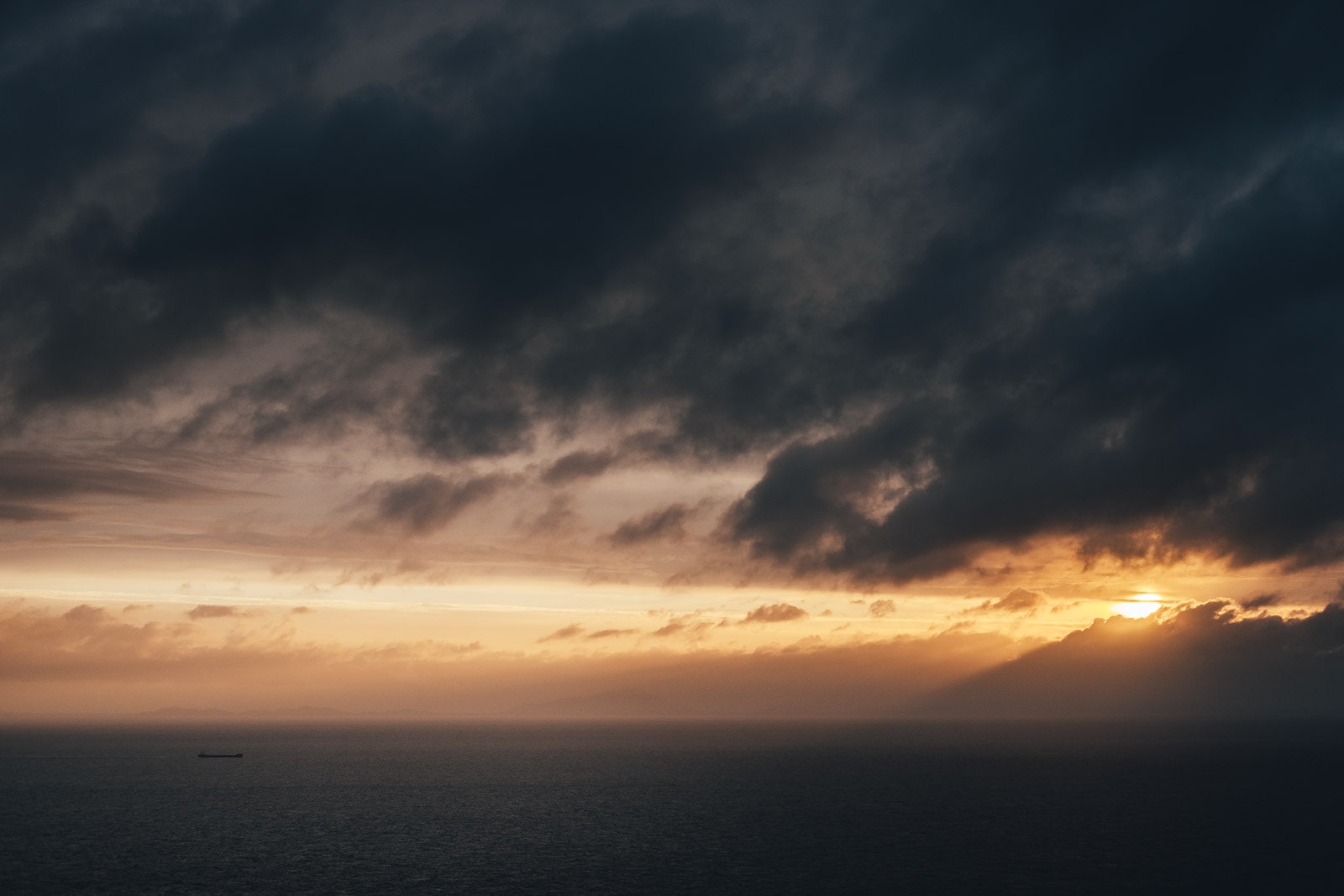 Isle of Skye Nesit Point Sunset Breaking Through Clouds